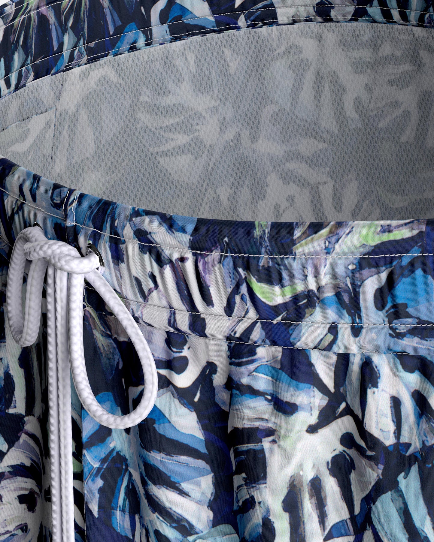 Bañador short con estampado de hojas sobre fondo marino de Impetus IM1943N2600
